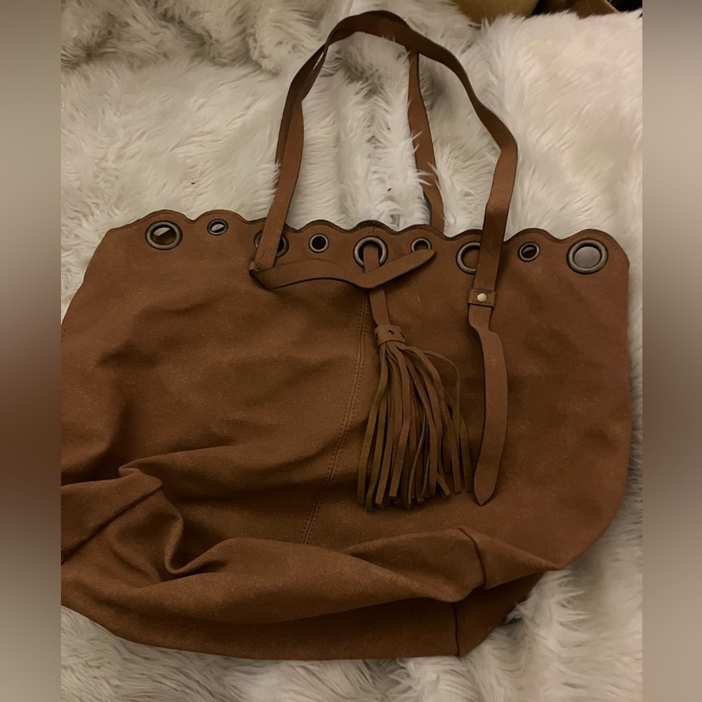 Suede / Leather Carry all tote with tassel. Great for fall. Great gift!